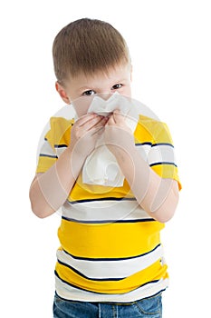 Portrait of a child wiping his nose