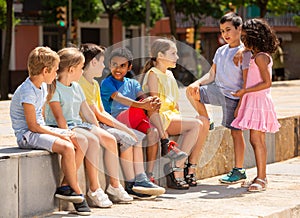Portrait of children during conversation outdoors