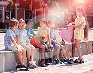 Portrait of children during conversation outdoors