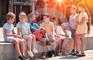 Portrait of children during conversation outdoors