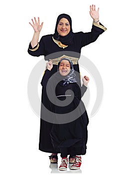 Portrait, children or muslim with a mother and daughter in studio isolated on a white background together as a family