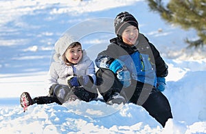 Portrait of children in nature during winter