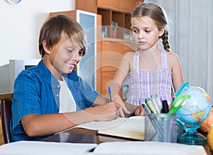 Portrait of children with textbooks and notes