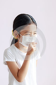 Portrait of a Children wearing sanitary masks and coughs