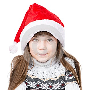 Portrait christmas girl in red santa hat. isolated on white