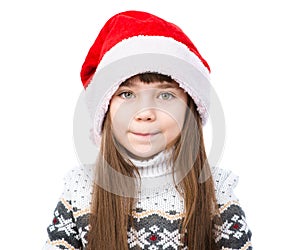 Portrait christmas girl in red santa hat. isolated on white
