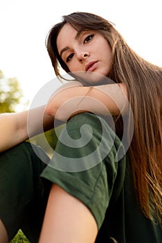 Portrait close-up. Female fashion. Spring meadow. Fashion woman. Rural nature. Summer season. Sunny yellow background