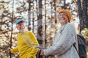 Portrait close up head shot of one cheerful smiling middle age woman walking with her husband enjoying free time and nature.