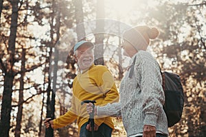 Portrait close up head shot of one cheerful smiling middle age woman walking with her husband enjoying free time and nature.