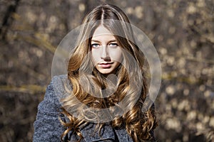 Portrait close up of young beautiful blonde schoolgirl