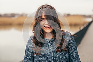 Portrait close up of young beautiful brunette woman