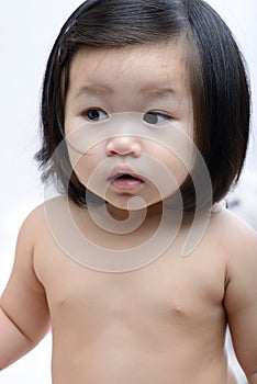 Portrait of closeup adorable girl doubt isolated on white back g