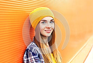 Portrait closeup beautiful young girl in yellow hat