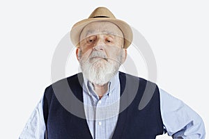 portrait of a cocky old man isolated on white background photo