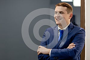 Portrait of concentrated lawyer working at workplace with documents in office