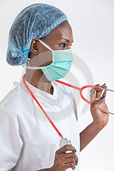 Portrait confident African American female doctor isolated on white background