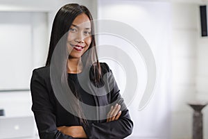 Portrait of Confident Asian business woman standing in the office