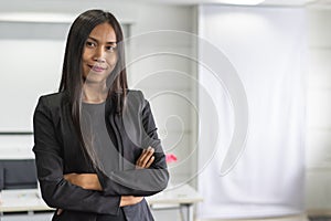 Portrait of Confident Asian business woman standing in the office