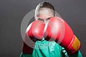 Portrait of confident beautiful young athlete woman with collect