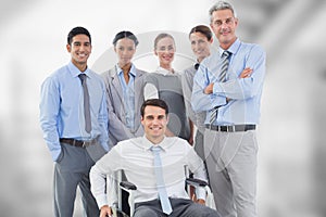 Portrait of confident business people against blurred background