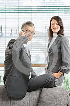 Portrait of confident business people in suit