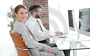 Portrait of confident business woman in her office