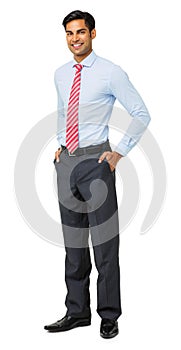 Portrait Of Confident Businessman With Hands In Pockets