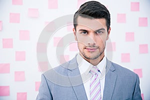 Portrait of a confident businessman looking at camera