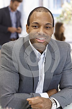 Portrait of confident businessman smiling