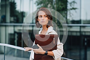 Portrait of a confident businesswoman with ginger hair