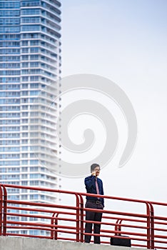 Portrait confident chinese asian office worker phone