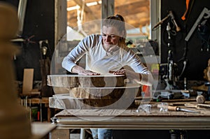 Portrait of confident craftswoman in her workshop