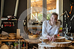 Portrait of confident craftswoman in her workshop