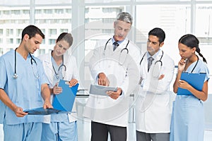 Portrait of confident doctors with arms crossed