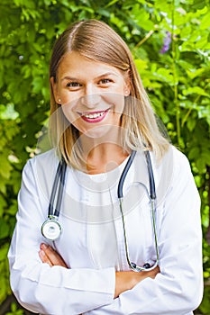 Smiling female doctor outdoor