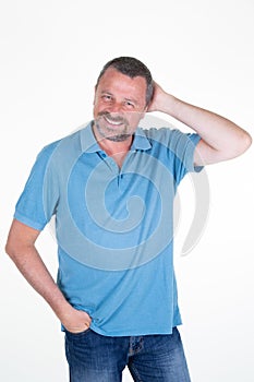 Portrait of confident handsome middle aged man standing on white background