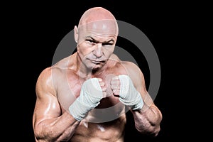 Portrait of confident man with fighting stance