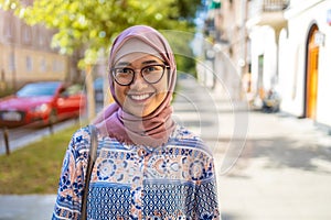 Portrait of a confident Muslim girl looking at camera