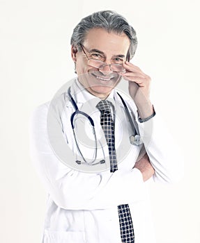 Portrait of a confident physician with stethoscope .isolated on white background