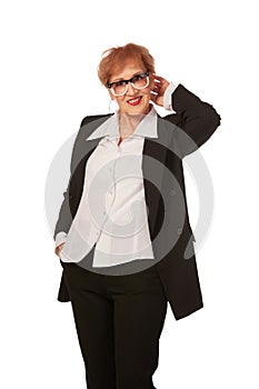 Portrait of confident senior executive manager. Stylish middle age woman in black business suit posing isolated on white