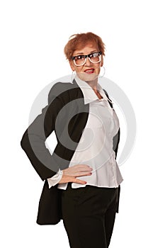 Portrait of confident senior executive manager. Stylish middle age woman in black business suit posing isolated on white