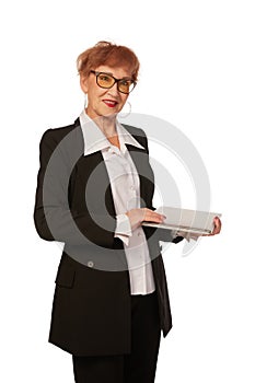 Portrait of confident senior executive manager. Stylish middle age woman in black business suit posing isolated on white