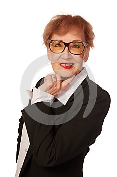 Portrait of confident senior executive manager. Stylish middle age woman in black business suit posing isolated on white