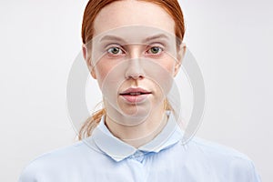 Portrait Of Confident Serioys Woman With Red Haire Looking At Camera