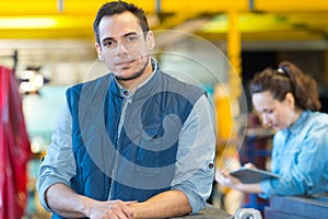 Portrait confident supervisor inside warehouse