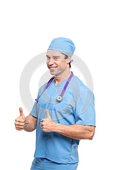 Portrait of confident young medical doctor / male nurse on white background.