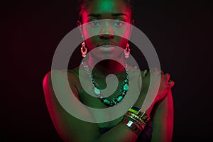 Sensuous Woman Wearing Jewelry Over Black Background