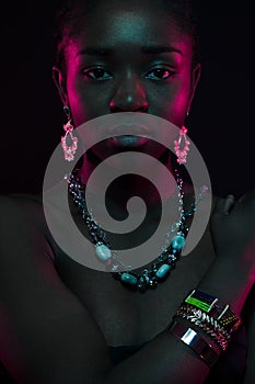 Sensuous Woman Wearing Jewelry Over Black Background