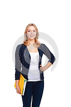 Portrait of a confident young woman standing isolated on white background