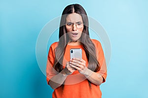 Portrait of confused person staring screen open mouth disbelief stupor isolated on blue color background